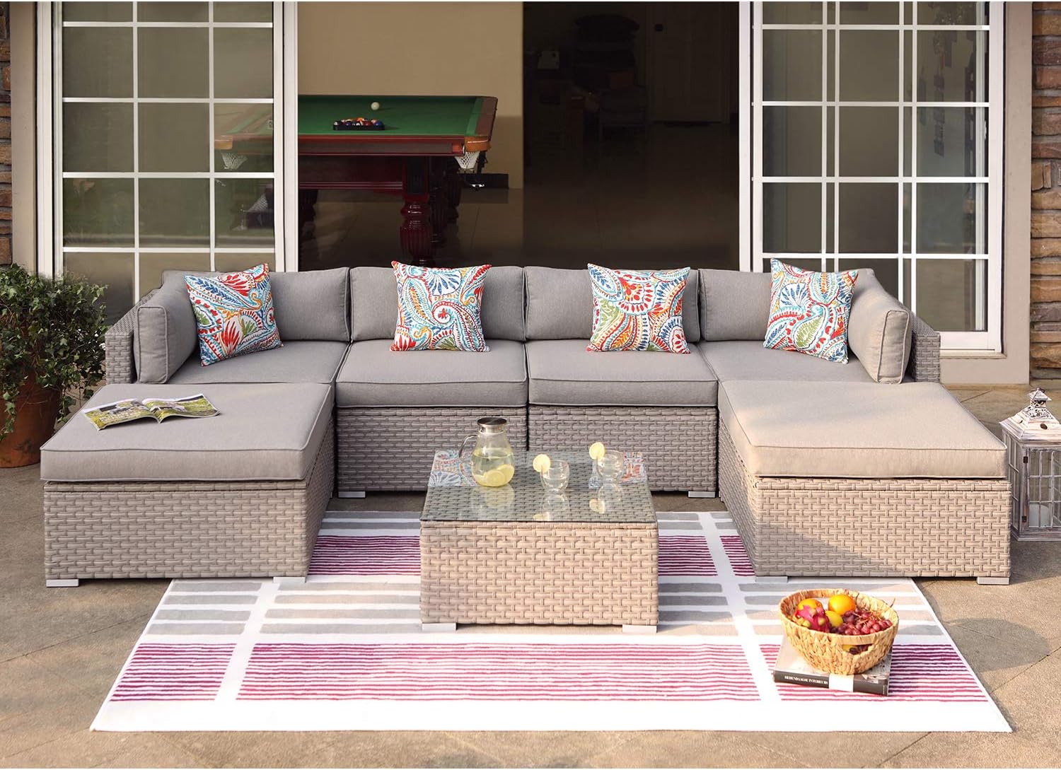 COSIEST 7-Piece Outdoor Furniture Warm Gray Wicker Family Sectional Sofa w Thick Cushions, Glass Top Coffee Table, 2 Ottomans, 4 Floral Fantasy Pillows for Garden, Pool, Backyard