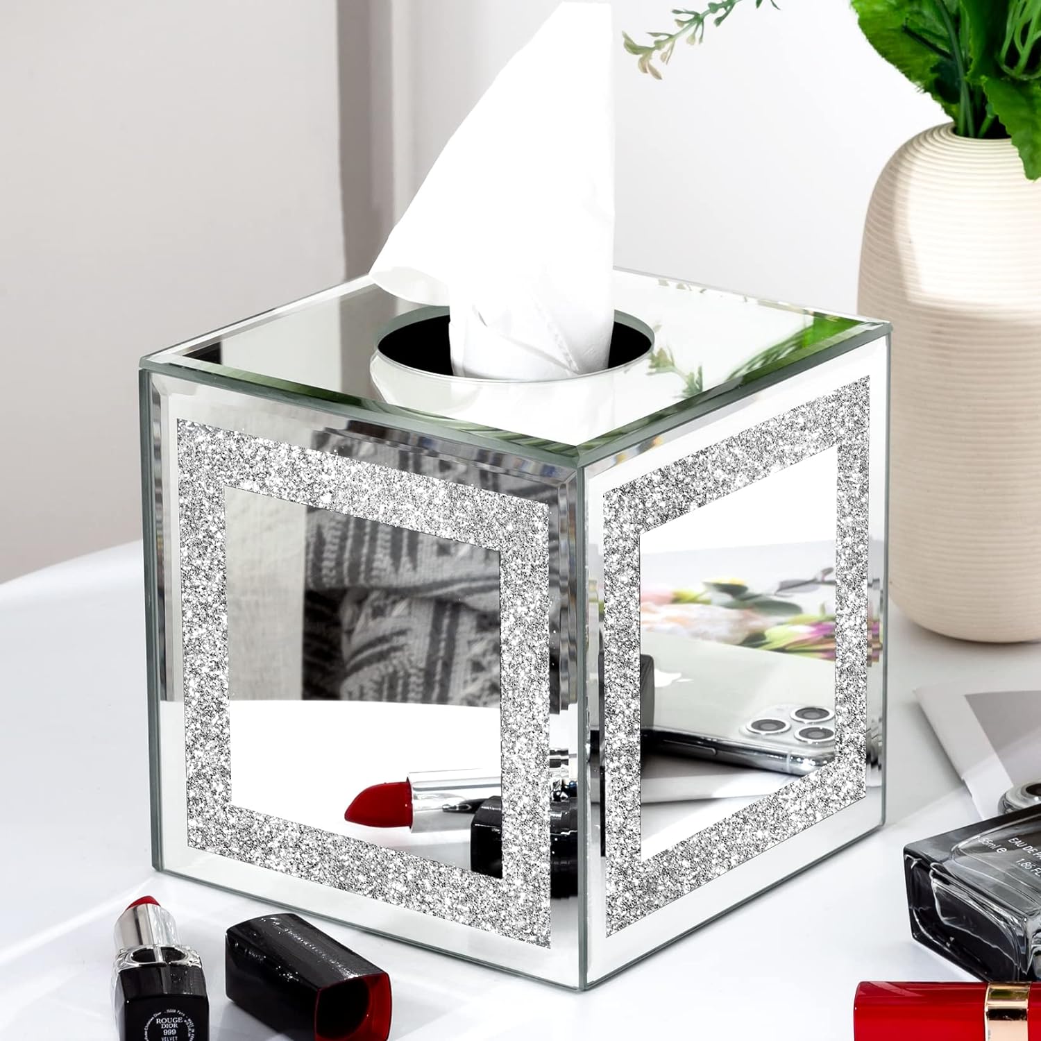 This Kleenex holder is absolutely gorgeous!!!!!! It is fairly heavy & well made. You have to take your kleenex out of your box & put in this holder, but that is not a problem that I see. I look at it and say WOW!!!! It was fairly expensive, but no regrets here.