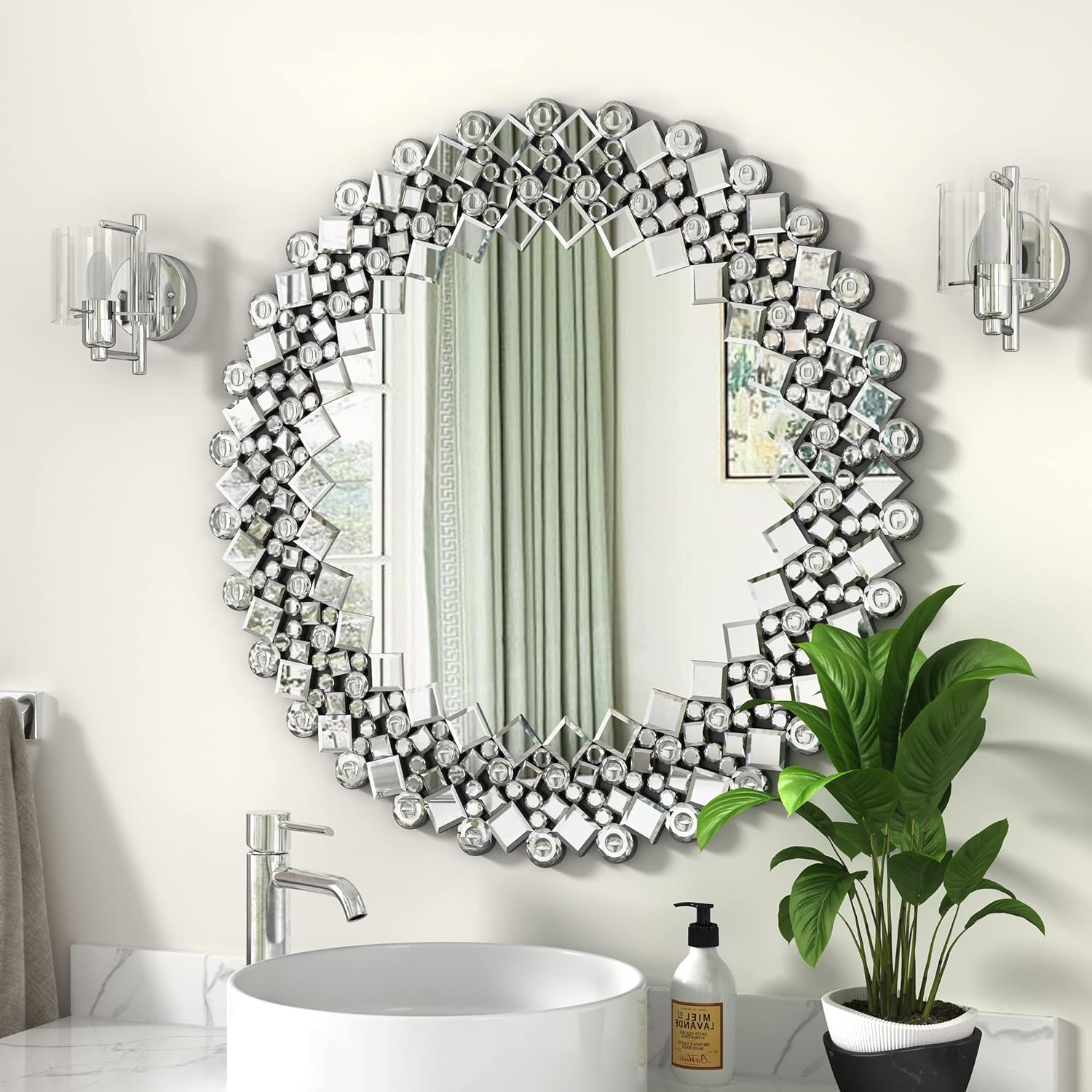 The beauty and elegance in the bathroom. This mirror brings out the beauty over the bathroom vanity.