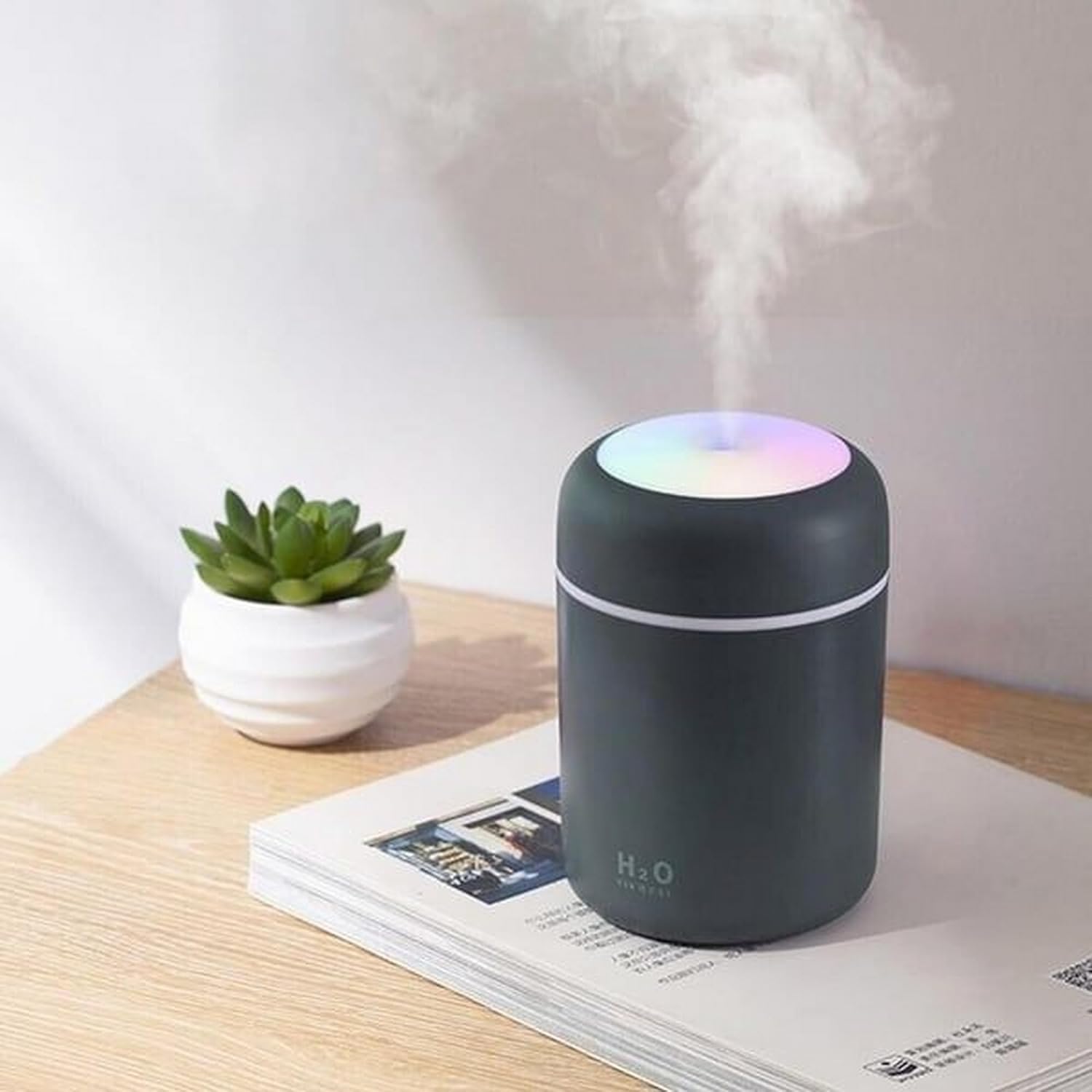 I've just purchased my second Portable Mini Humidifier from this trusted brand, and I'm even more in love with it than before! The unique colorful volcanic texture design is what caught my eye initially, and it doesn't disappoint in person. It' not just a humidifier; it' a piece of decor that adds a vibrant touch to any space. The 300mL capacity is perfect for my needs, providing a cool mist that keeps my bedroom feeling fresh and comfortable. The USB power feature is incredibly convenient, of